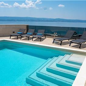 5 bedroom beachfront villa with heated pool near Omis, sleeps 9